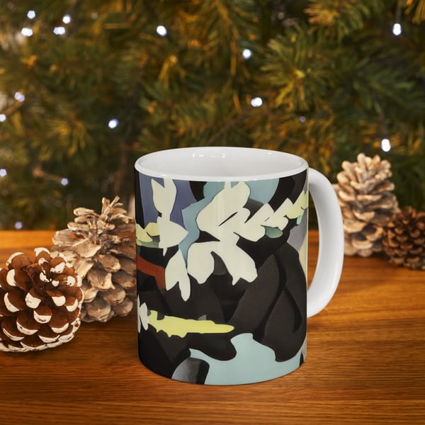 A digital artwork on a mug featuring abstract nature-inspired patterns in muted earth tones, set against a festive backdrop with sparkling lights and pine cones.